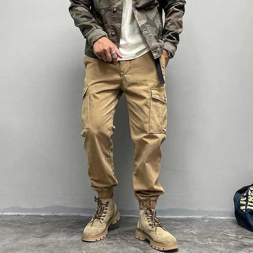 Solto masculino cor sólida grande bolso botão carga calças moda homem novo clássico rua casual ligar um dos pés calças masculinas